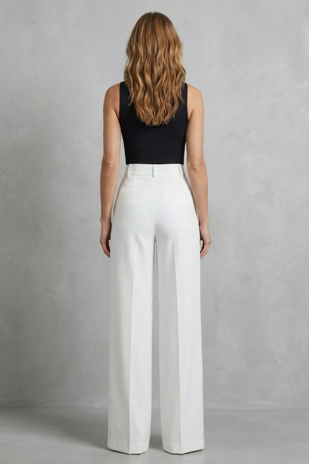 Tailored pleats – High-waist wide-leg trousers