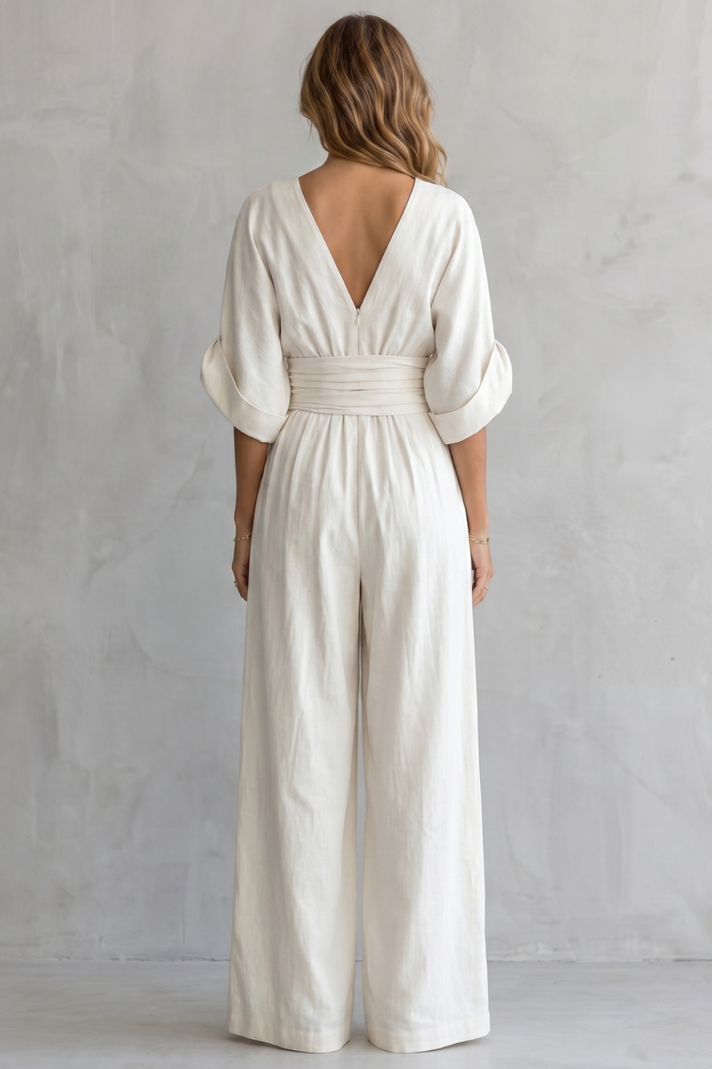 Draped waist elegance – Wide-leg jumpsuit